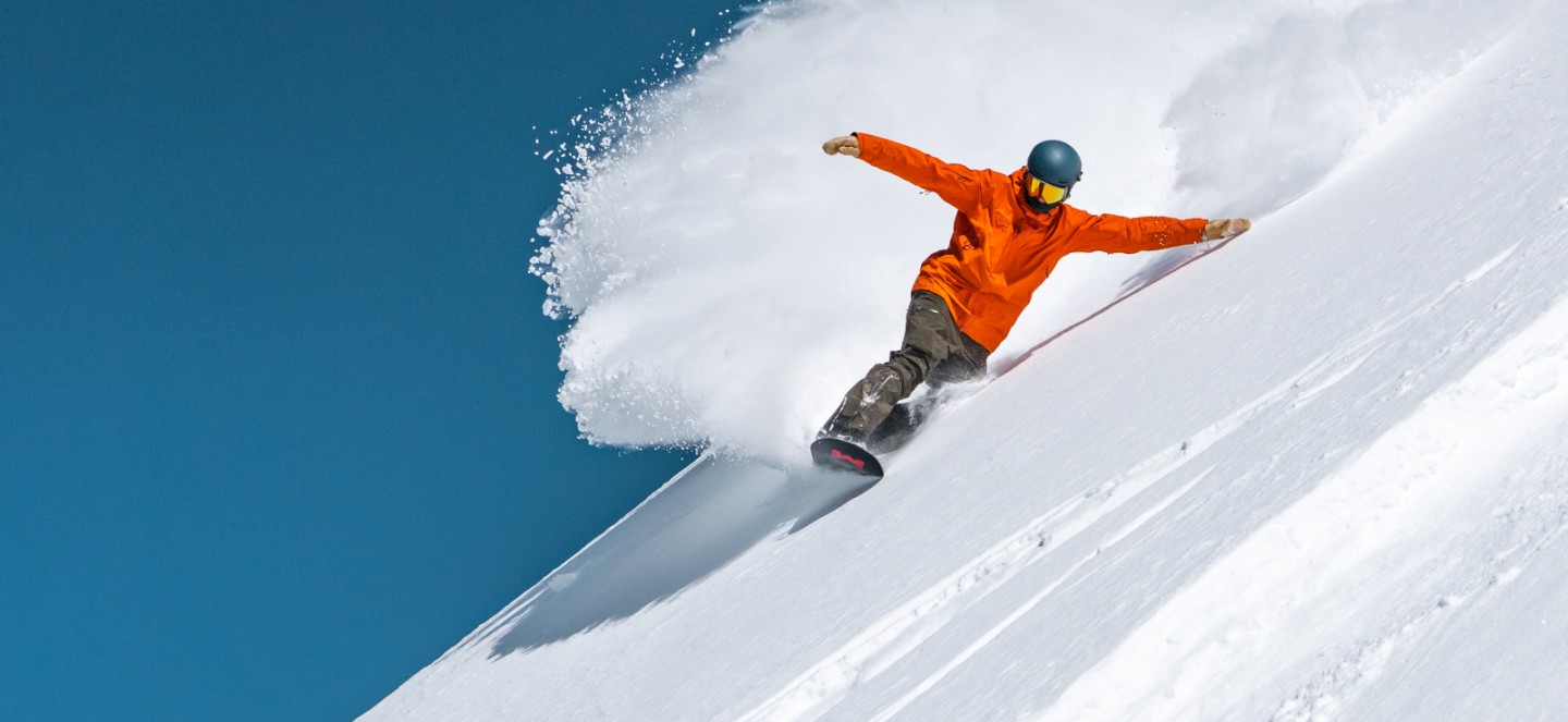 Gold pass background image of a person skiing